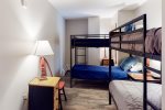 Two sets of bunk beds in this unit`s second bedroom